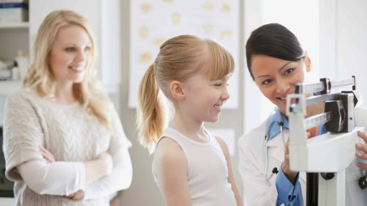 mother with daughter at doctors appointment